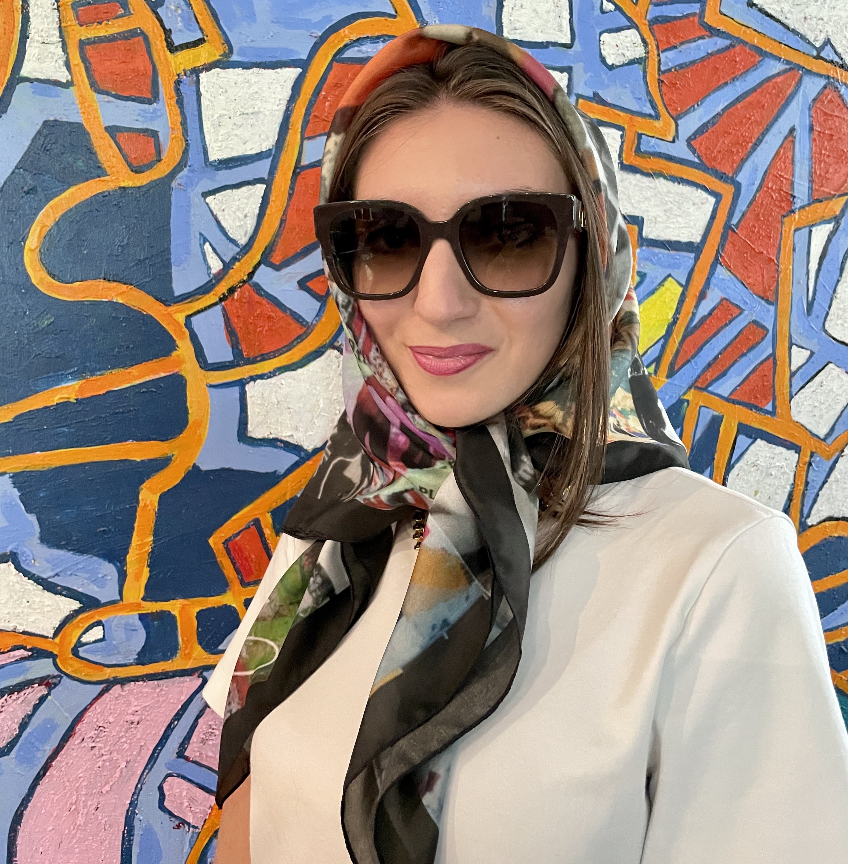 Francesca wears Poésie Original to keep her hair in place.